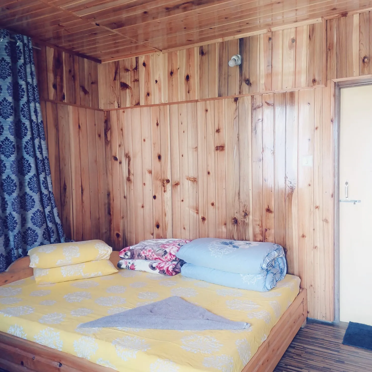 Rigsel Homestay Double Bed Room — natural light and comfortable interiors